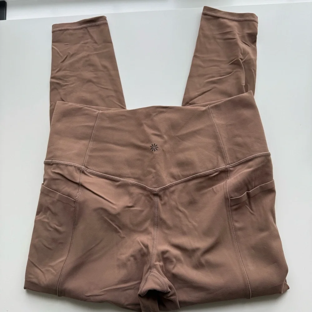 Athleta Salutation Stash Tight Size Large